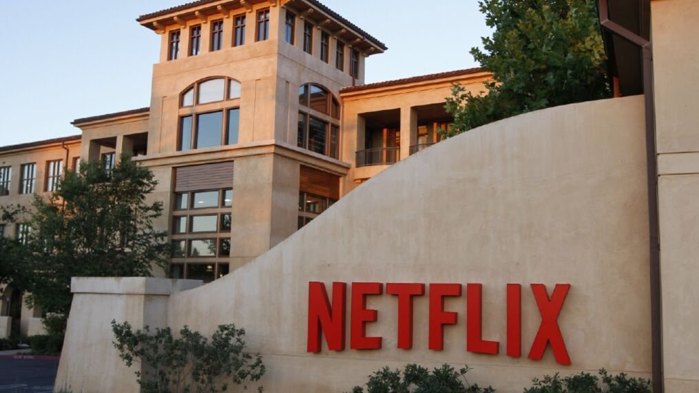 Explain the reasons of buying US stock Netflix (NFLX) and share my views.